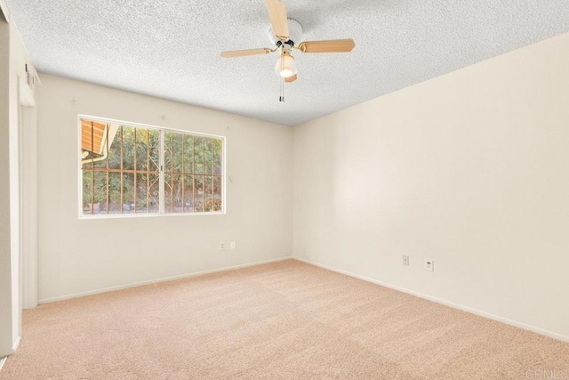 1403 Goff Ct, San Diego, CA 92114 - unfurnished room with carpet floors, a textured ceiling, a ceiling fan, and baseboards