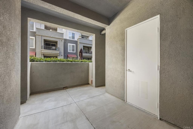 interior space with a balcony