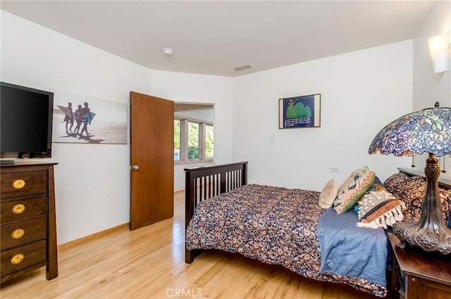 bedroom featuring light hardwood / wood-style flooring