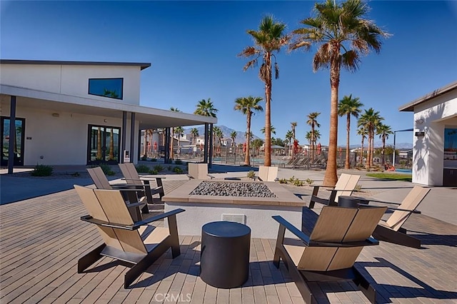 view of patio featuring an outdoor fire pit