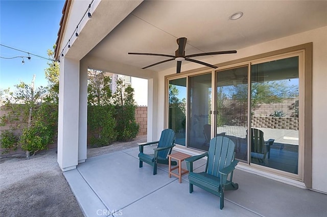 view of patio with ceiling fan