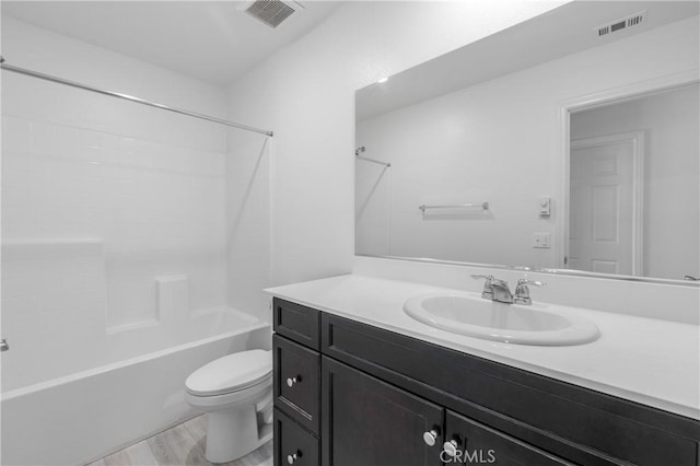 full bathroom with shower / bathtub combination, toilet, and vanity