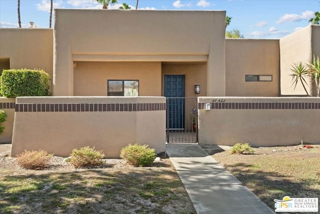 view of adobe home