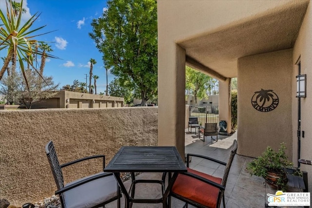 view of patio with a balcony