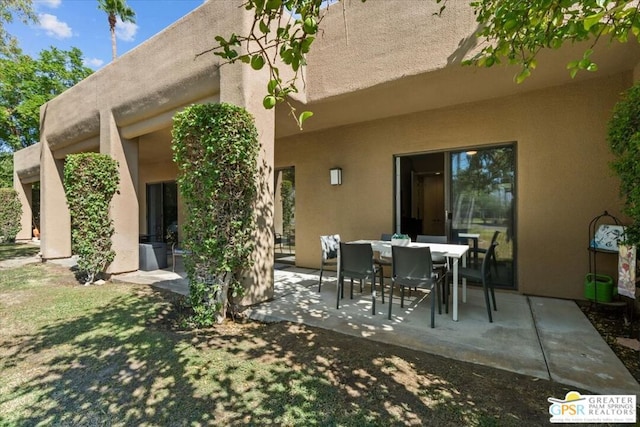 rear view of house featuring a patio area