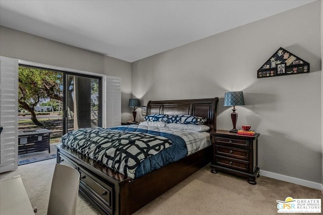 bedroom featuring access to exterior and light colored carpet