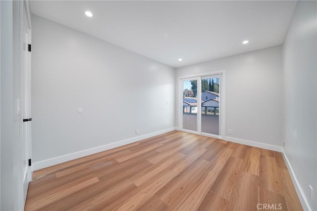 empty room with light wood-type flooring