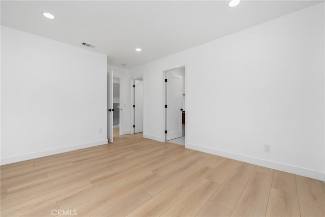 empty room featuring light hardwood / wood-style flooring