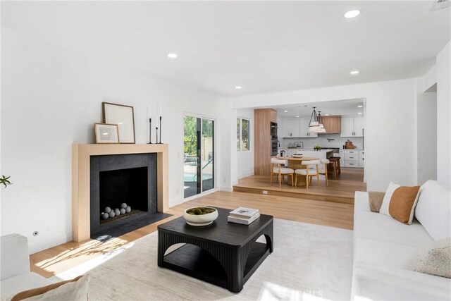 living room with light wood-type flooring