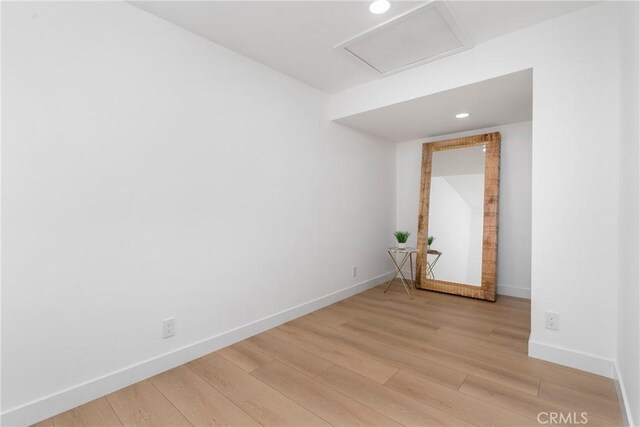 unfurnished room featuring wood-type flooring