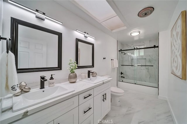 full bathroom featuring toilet, enclosed tub / shower combo, and vanity