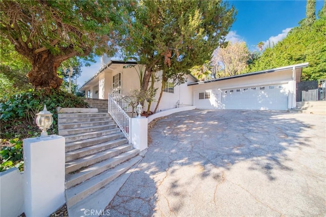 view of front of home with a garage