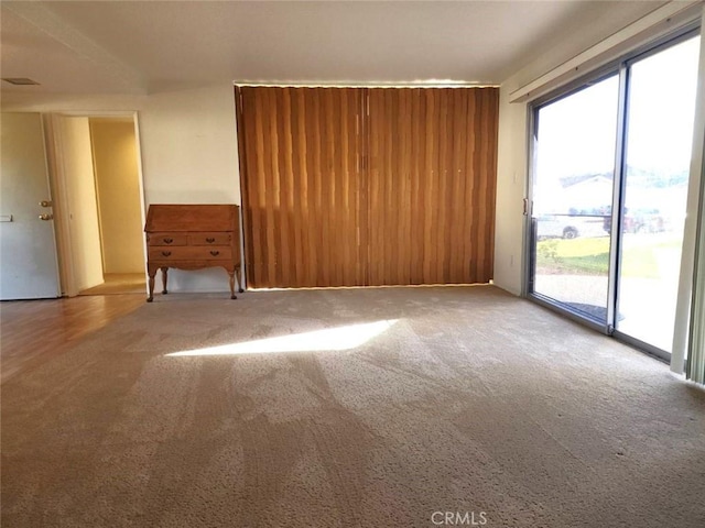 spare room featuring carpet flooring