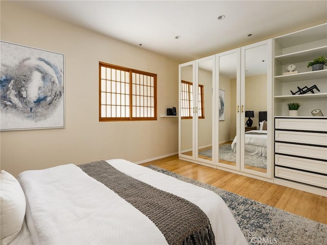 bedroom featuring hardwood / wood-style floors