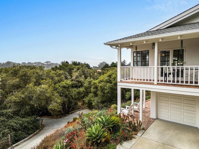 view of property exterior featuring a garage