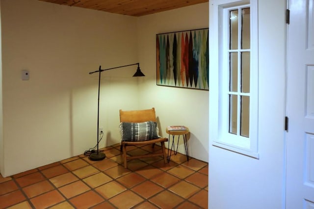 sitting room featuring tile patterned flooring