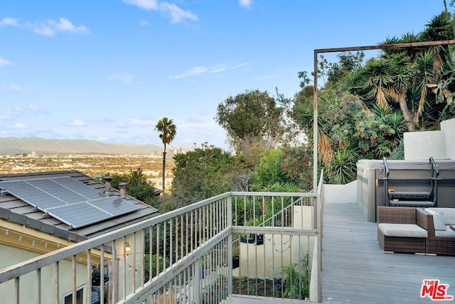 balcony featuring a mountain view