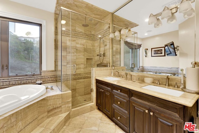 bathroom featuring vanity and plus walk in shower