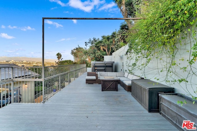 deck featuring an outdoor hangout area