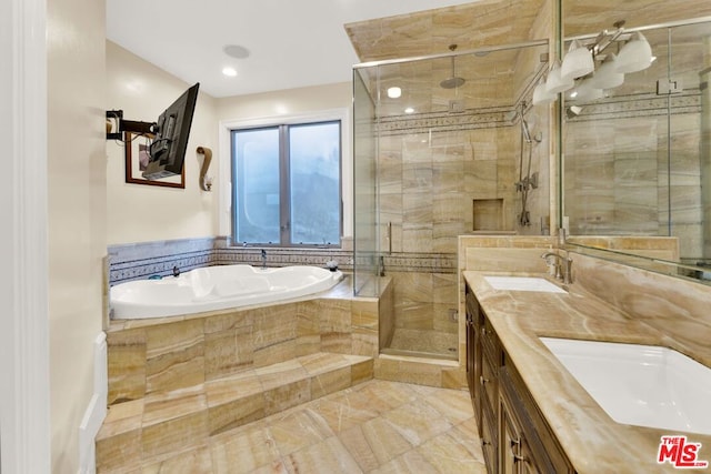 bathroom with plus walk in shower and vanity