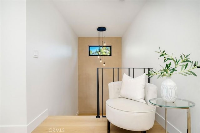 sitting room featuring hardwood / wood-style floors