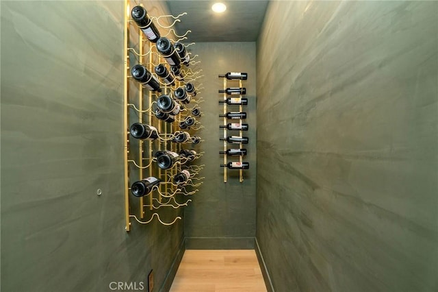 wine room featuring hardwood / wood-style floors