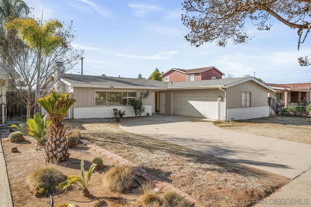 ranch-style house featuring a garage