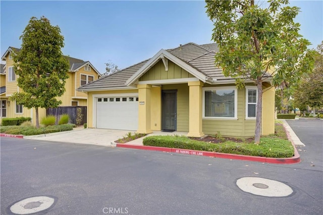 view of front of property with a garage