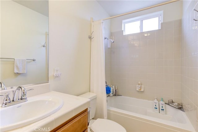 full bathroom featuring toilet, vanity, and shower / bath combination with curtain