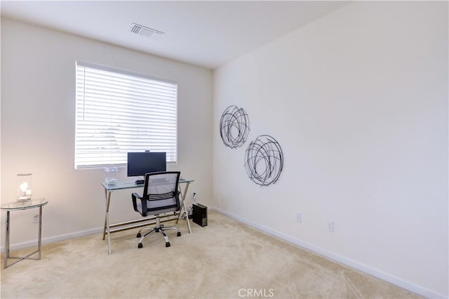 office space with light carpet