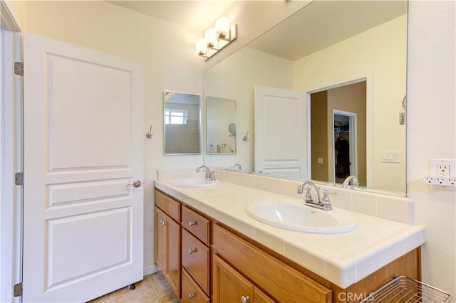 bathroom featuring vanity and tile patterned floors