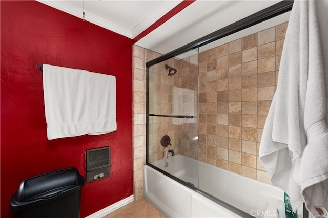 bathroom featuring heating unit, enclosed tub / shower combo, and crown molding