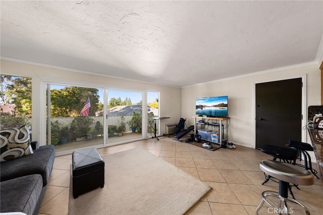 tiled living room with ornamental molding and a textured ceiling