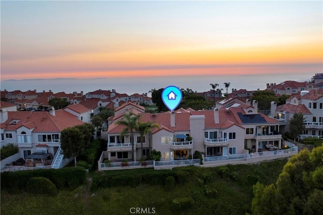 aerial view at dusk with a residential view