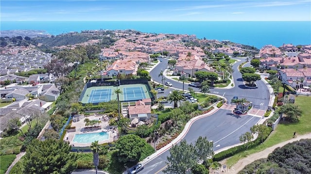 bird's eye view with a water view and a residential view