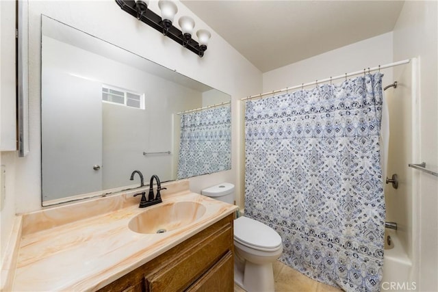 full bathroom featuring tile patterned floors, toilet, vanity, and shower / tub combo