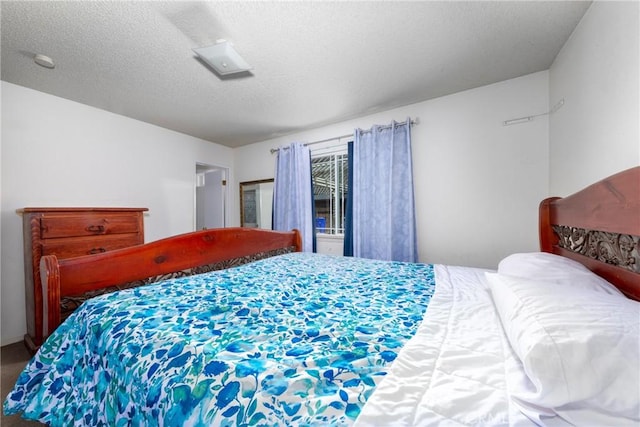 bedroom with a textured ceiling