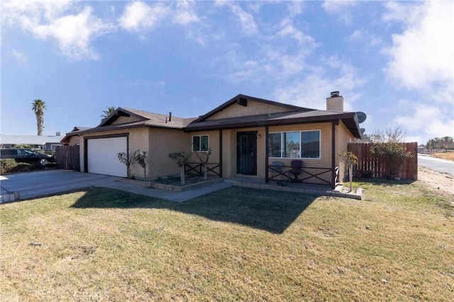 ranch-style home with a garage and a front yard