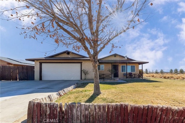 single story home with a garage and a front lawn