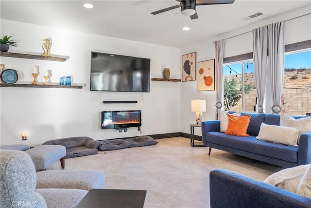 living room with ceiling fan