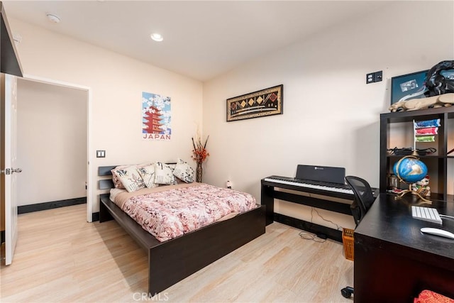 bedroom featuring light hardwood / wood-style floors