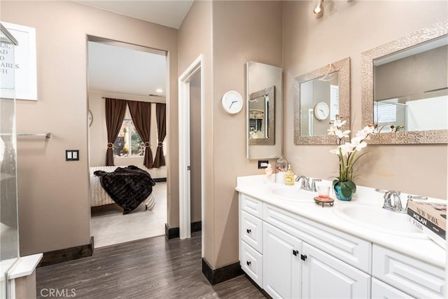 bathroom featuring wood-type flooring and vanity