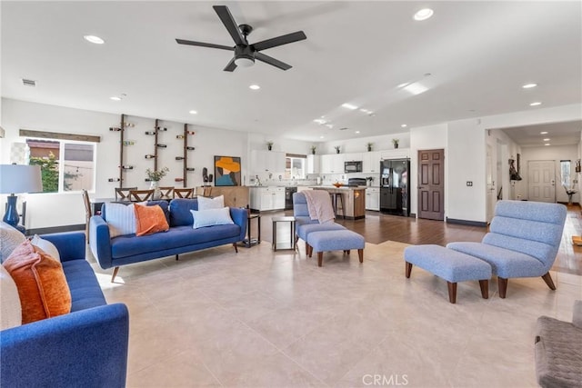 living room featuring ceiling fan