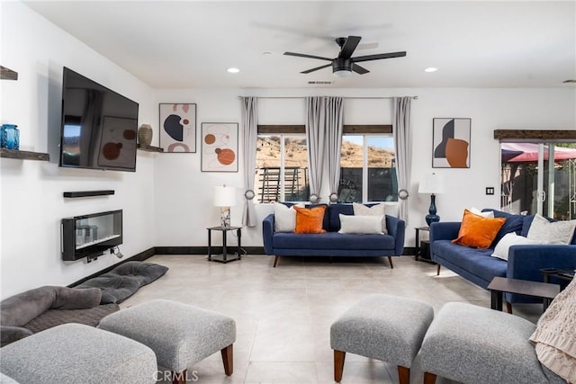 living room with ceiling fan