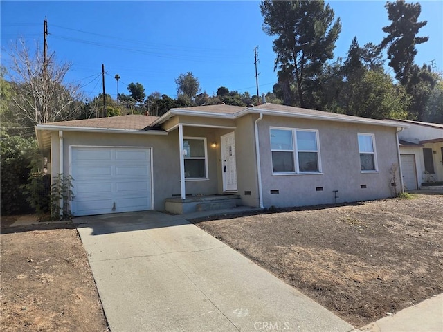 single story home with a garage