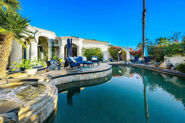 view of swimming pool with a patio area and outdoor lounge area