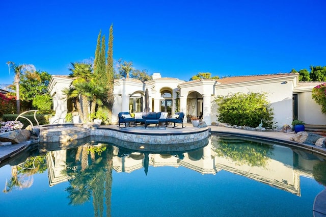 view of pool with outdoor lounge area