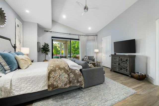 bedroom with ceiling fan, wood-type flooring, high vaulted ceiling, and access to outside