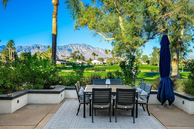 view of patio / terrace featuring a mountain view