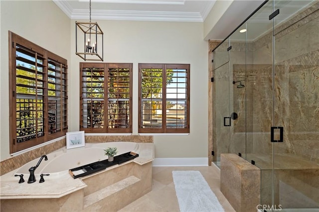 bathroom with plus walk in shower, an inviting chandelier, ornamental molding, and tile patterned floors